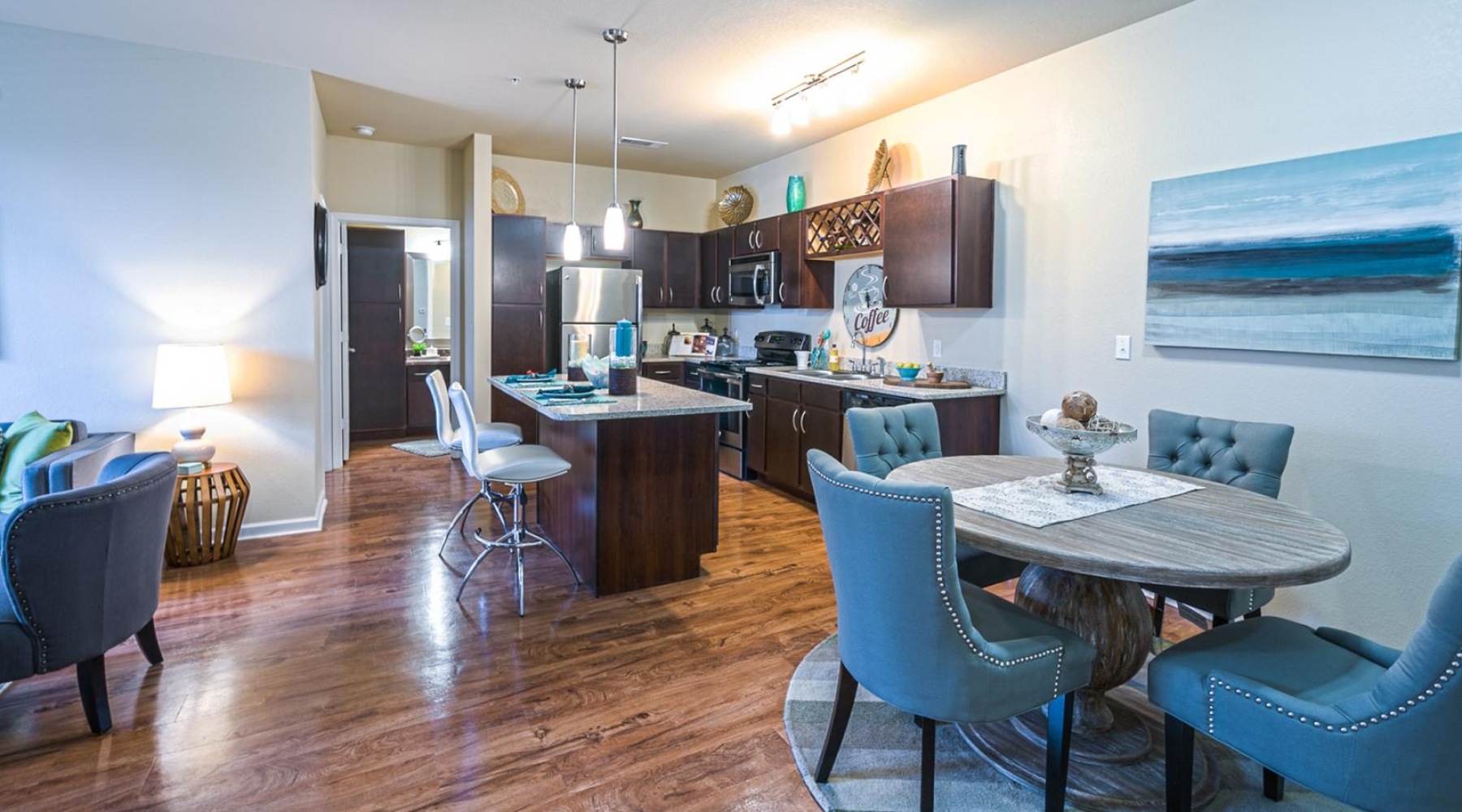 a large living room with a wood floor